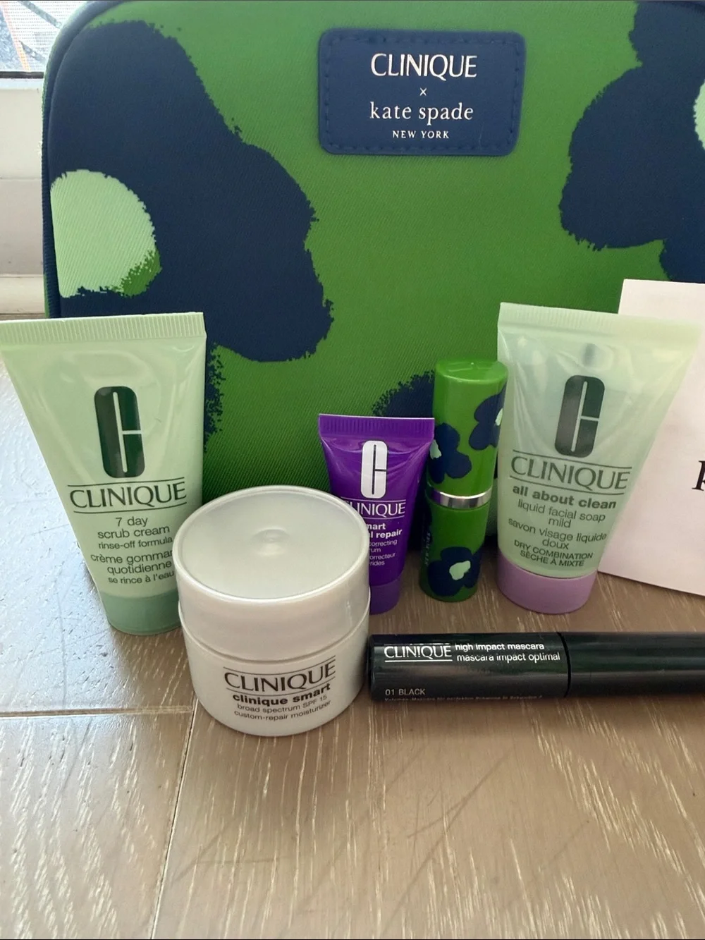 NWT Clinique Kate Spade Makeup Pouch and travel size skin and makeup products